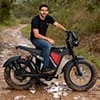Rider Carlos R. posing with his BLJ-2011 bike on a muddy path.