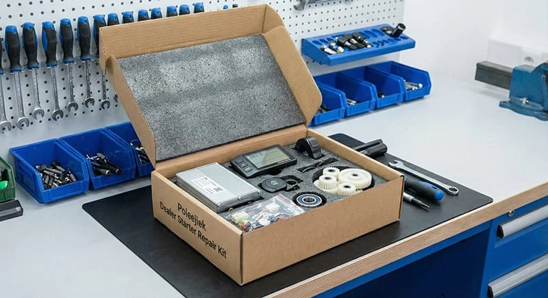 A curated Poleejiek dealer starter repair kit containing essential electric bike parts like controllers, displays, throttles, and sensors for immediate service needs.