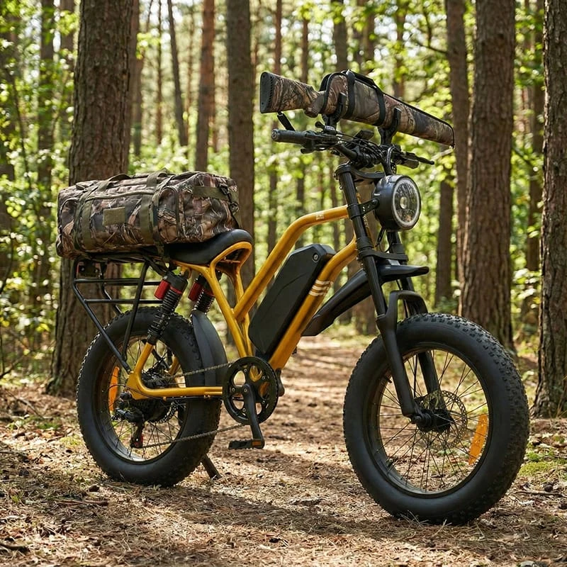 Fully accessorized electric hunting bike with rear rack and gun holder, illustrating high-margin upsell opportunities for B2B dealers.